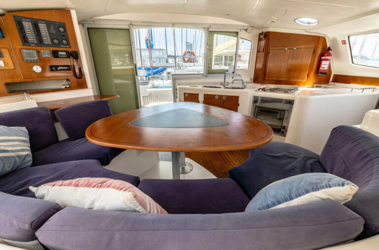 Chiquita catamaran's dinette seating and navigation station