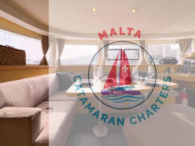 Interior dining table set aboard Bowie Lagoon 42 catamaran