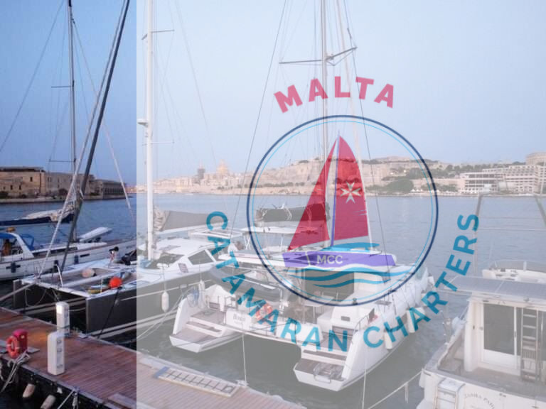 Bowie Lagoon 42 catamaran moored at dusk with Valletta's skyline in the background