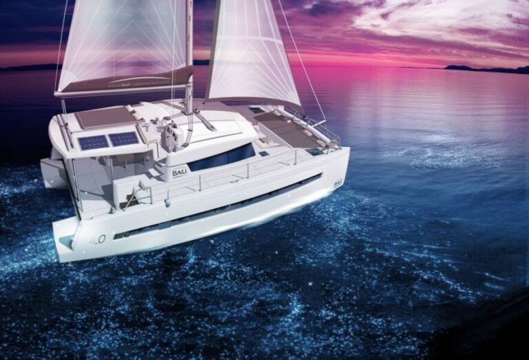 Bali 4.0 Catspace catamaran sailing at sunset, the model of Angelina Mia (manufacturer image)