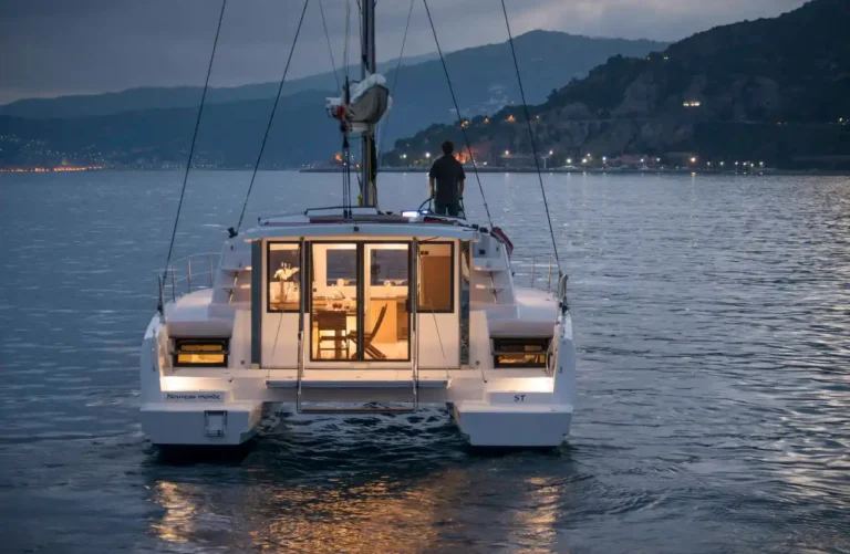 Bali 4.0 Catspace catamaran moored at dusk, showing the stern layout (manufacturer image)