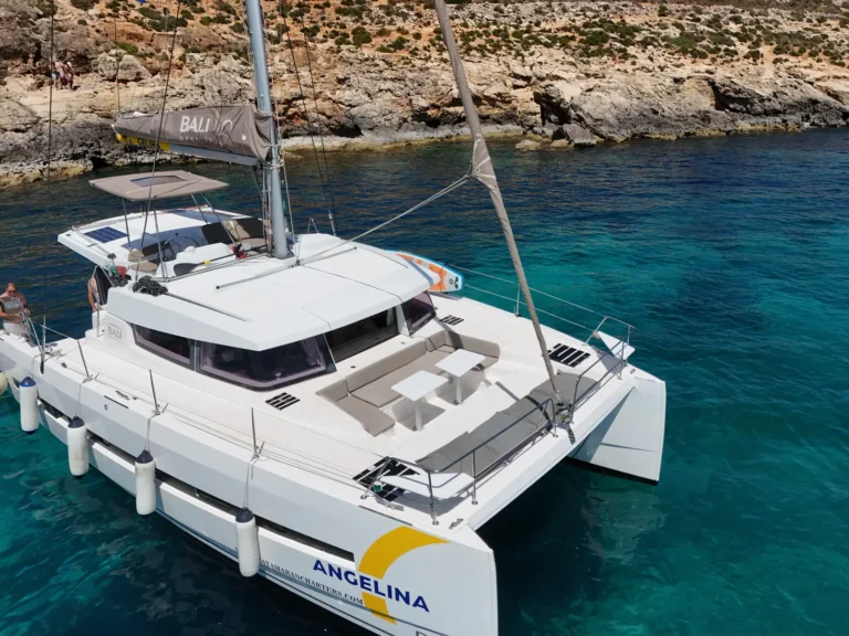 Close-up of Angelina Mia's open deck and flybridge, a Bali 4.0 Catspace catamaran in Malta