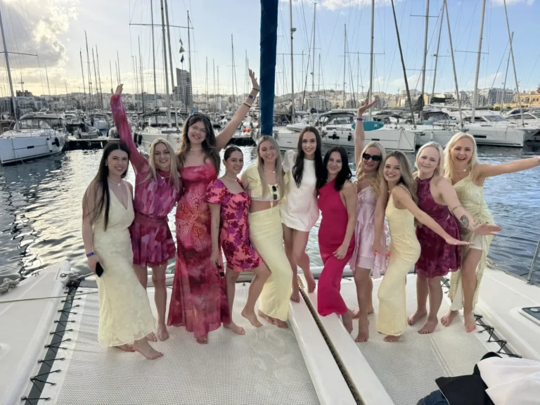 Hen party group celebrating on board a private catamaran charter in Malta